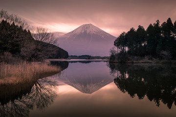 Mountain Fuji and Lake Tanumi with beautiful sunrise in winter season. Lake Tanuki is a lake near Mount Fuji, Japan. It is located in Fujinomiya, Shizuoka Prefecture