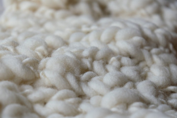 White knitted woolen fabric
