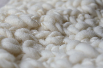 White knitted woolen fabric