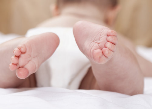 Tiny newborn baby foot