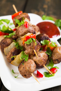 Kebab with meat balls and vegetables