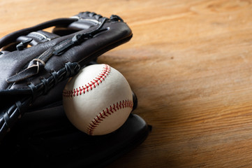 baseball glove and baseball