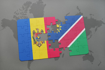 puzzle with the national flag of moldova and namibia on a world map