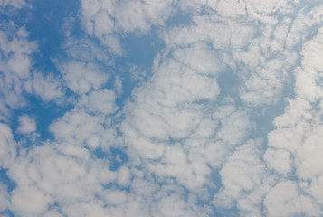 Blue sky with clouds background