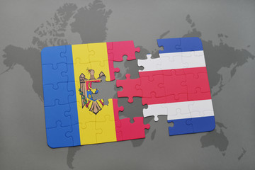 puzzle with the national flag of moldova and costa rica on a world map