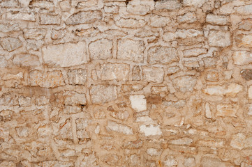 Masonry background of old Zadar stone building, Croatia
