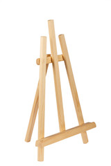 Wooden painter easel isolated on white. academy tripod.