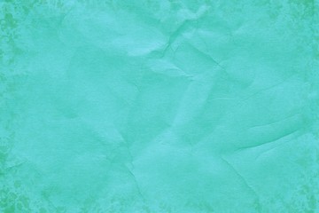 Green retro crumpled kraft paper background