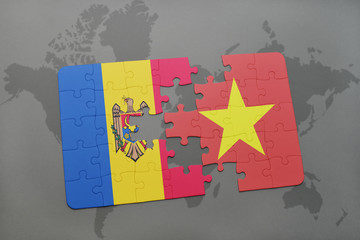 puzzle with the national flag of moldova and vietnam on a world map