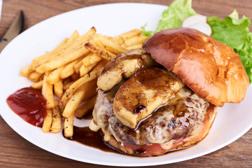 Dish with burger and french fries