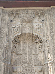 Madrasah with thin minaret, stone carving, seljuq empire