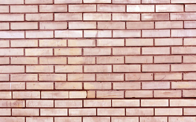 Red toned brick wall texture