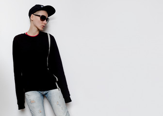 Tomboy Model Urban Outfit cap and Hoodie Fashion Trend