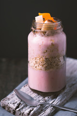 Delicious berry smoothies with oatmeal, side view