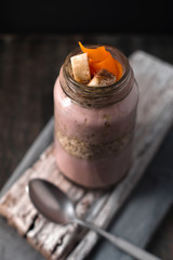 Delicious berry smoothies with oatmeal on the rustic stand