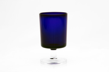 glass with red vine isolated on a white background