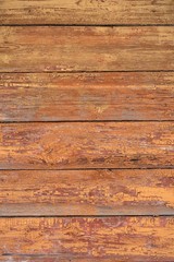 Old shabby wooden wall painted faded brown