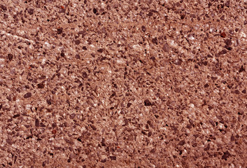 Red color grungy cement wall.