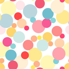 Seamless abstract pattern of association of the round elements in yellow, pink, red, blue colors on a white background.