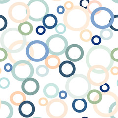 Seamless abstract pattern of combining elements of the rings in blue, peach, blue and green