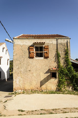 view of an empty street in a traditional old village in dalmatia, croatia