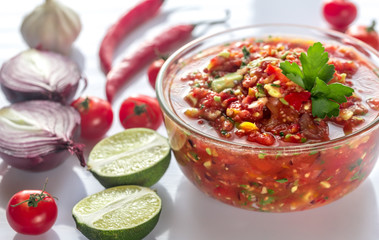 Bowl of salsa with ingredients