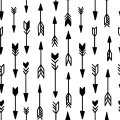 Seamless hand drawn geometric tribal pattern with arrows. Vector navajo design.