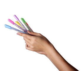 Colored pens set in hand 