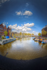 Naklejka premium Traditional old buildings in Amsterdam