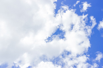 Blue sky with clouds. Cloudy blue sky.