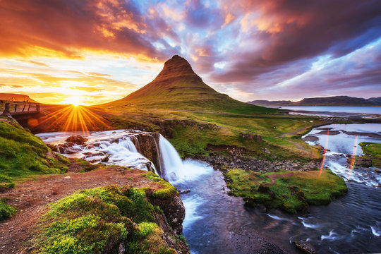 The picturesque sunset over landscapes and waterfalls. Kirkjufel © standret