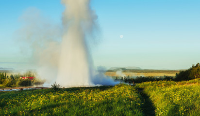 Fototapeta na wymiar Fantastic sunset Strokkur geyser eruption in Iceland
