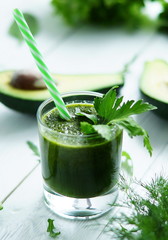 Green smoothies avocado and fresh herbs 