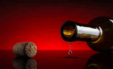 drop wine stopper bottle movement red background