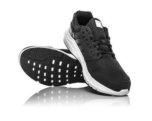 Black unbranded sneakers.