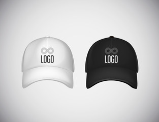 Realistic front view black and white baseball caps with logo lettering for advertising isolated on white background vector illustration.