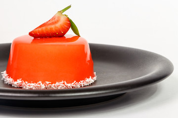 Red cake with strawberries.