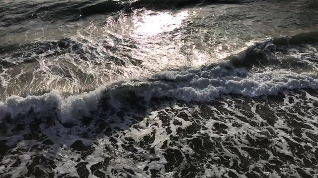 Beach scene, Los Angeles, California, USA. Venice Beach is is known for its canals, beaches and circus-like Ocean Front Walk. Slow Motion
