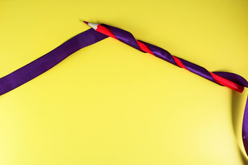 purple ribbon and red pencil pop art