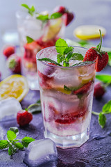 Freshly made strawberry mojitos