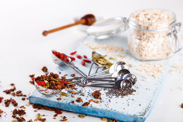 Granola,Oatmeal,Muesli on a White Background.Breakfast.Vegetarian.Food or Healthy diet concept.Copy space for Text. selective focus.
