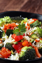 Colorful rice and vegetable salad - fresh mixed colorful healthy