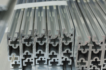Cross sections of extruded aluminium or aluminum channels for use in manufacturing and fabrication - obrazy, fototapety, plakaty