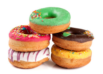 pile of glazed donuts isolated on white background