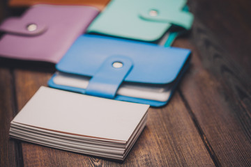 multi-colored business card and badges