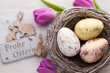 Tuinposter Easter and spring decoration, flowers and eggs. © gitusik