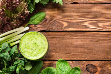 Fototapeta na wymiar Healthy detox green smoothie from greens and mint