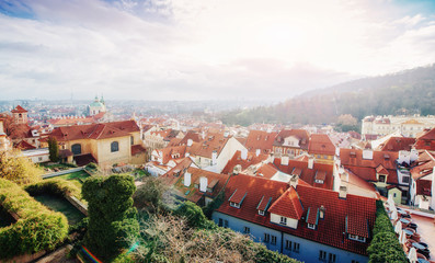 Fototapeta na wymiar The red roof in Prague. Panoramic view of from Cas