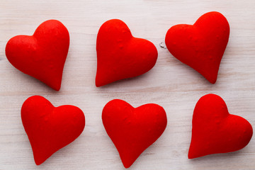 Red hearts the gray background. Valentine Day background.