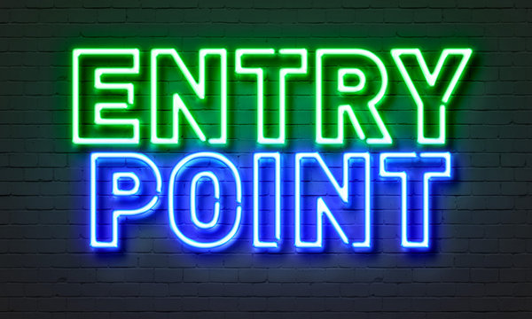 Entry Point Neon Sign On Brick Wall Background.